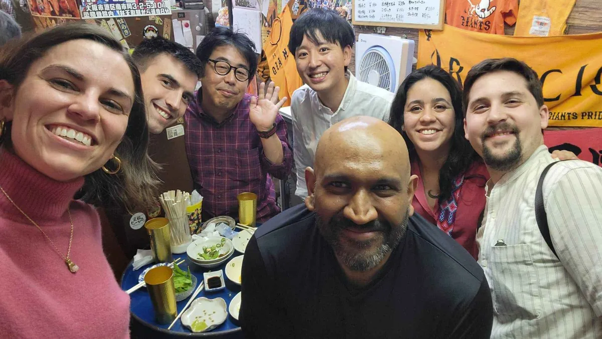 Charcoal yakitori grill in a backstreet shop near Dotonbori on a local food tour, Osaka Japan