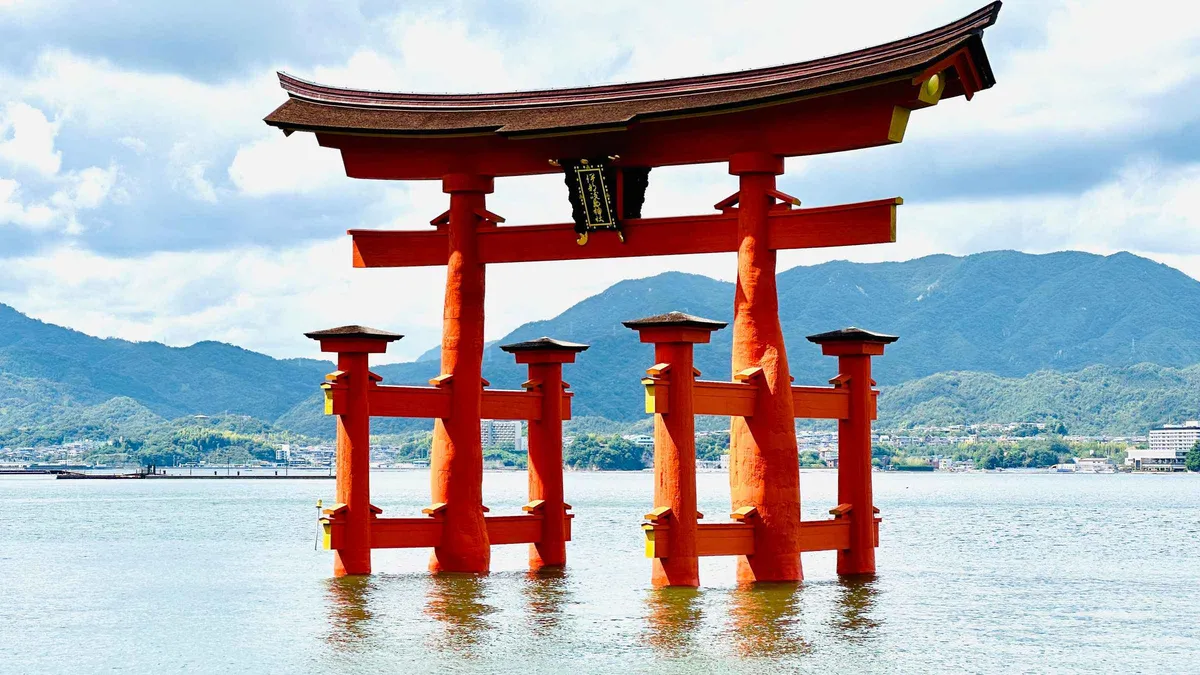 The floating torii of Itsukushima Shrine at Miyajima on a bullet-train day trip from Osaka, Osaka Japan