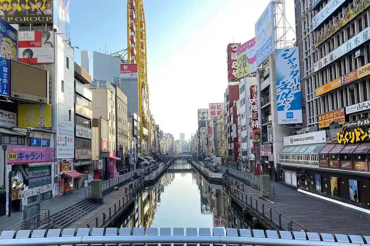The Dotonbori canal and its illuminated signage at night, Osaka, Japan